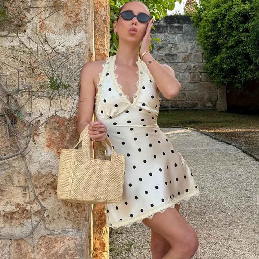 Abito mini Margot in pizzo senza schiena