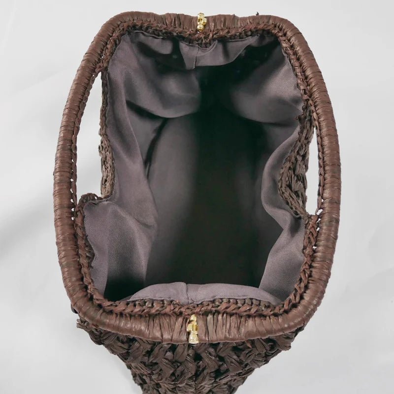 Pochette Sophia intrecciata in paglia con conchiglia