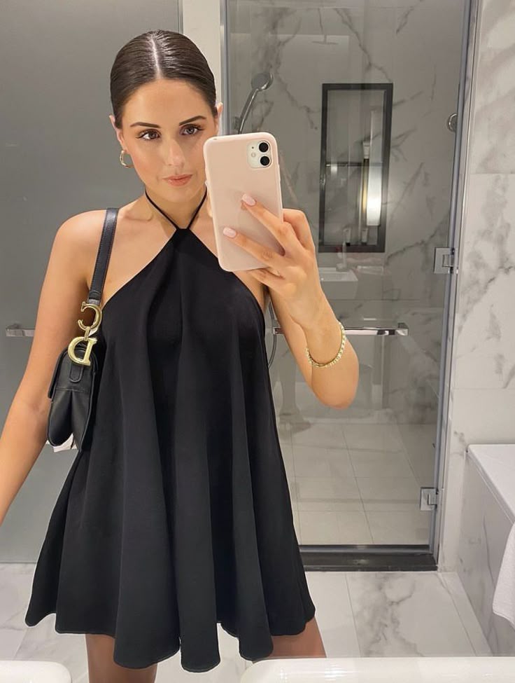 Yasmin miniabito halter con schiena scoperta