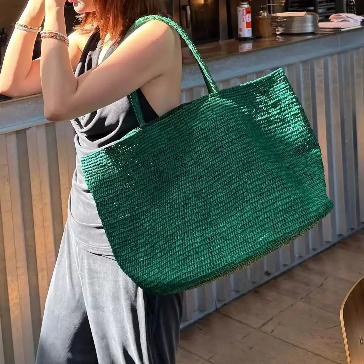 Vivienne borsa a mano in rattan intrecciato