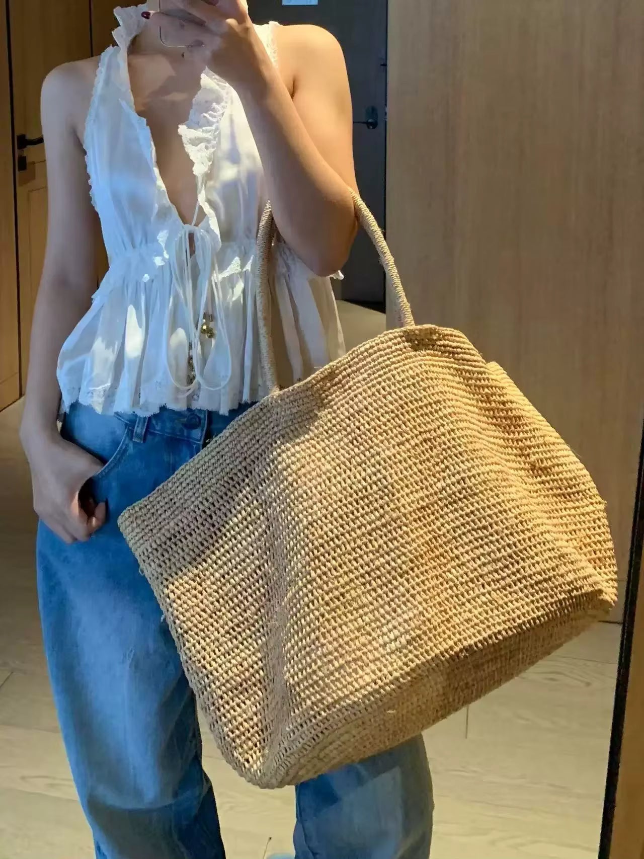 Vivienne borsa a mano in rattan intrecciato