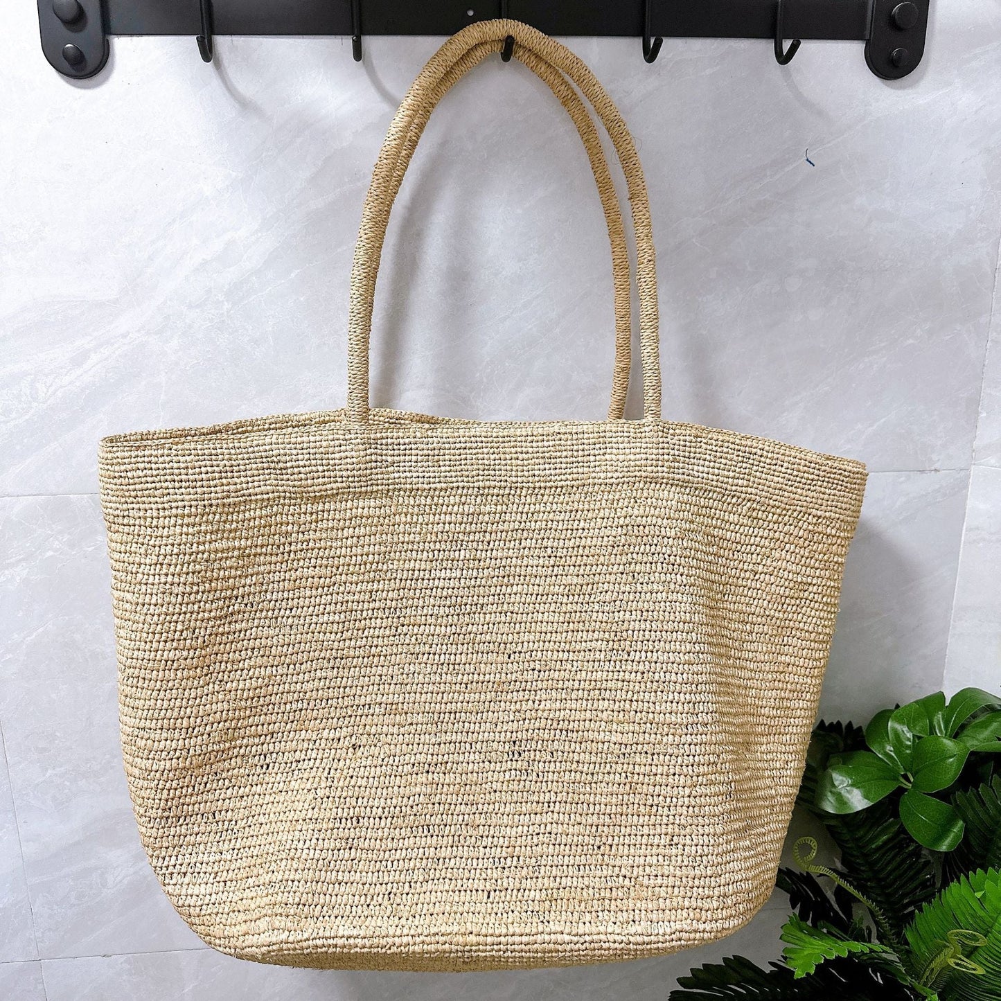 Vivienne borsa a mano in rattan intrecciato