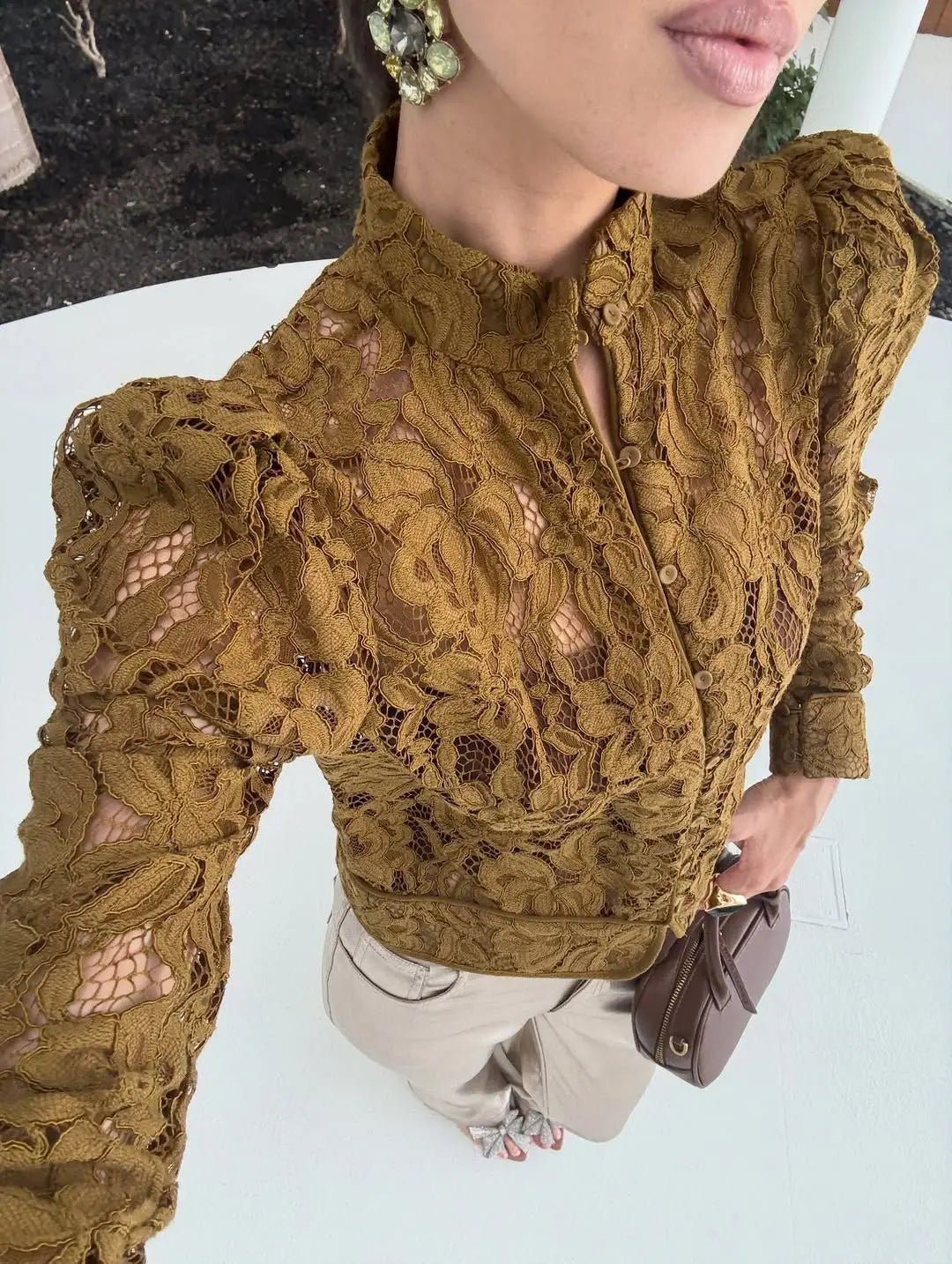 Blusa trasparente in pizzo Hannah