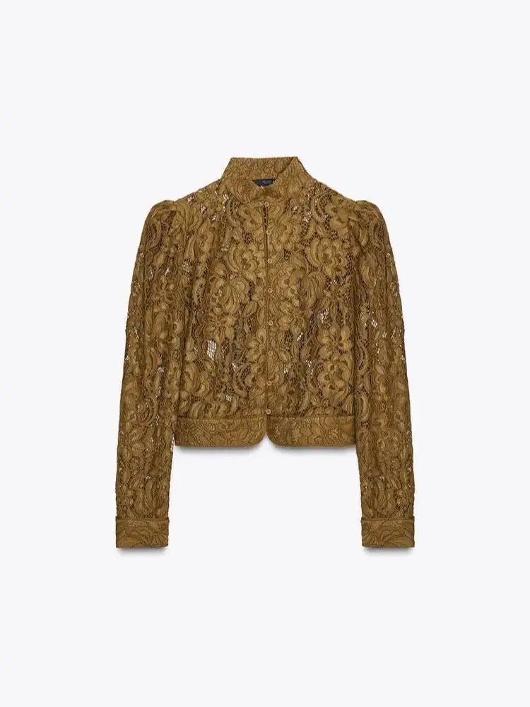 Blusa trasparente in pizzo Hannah