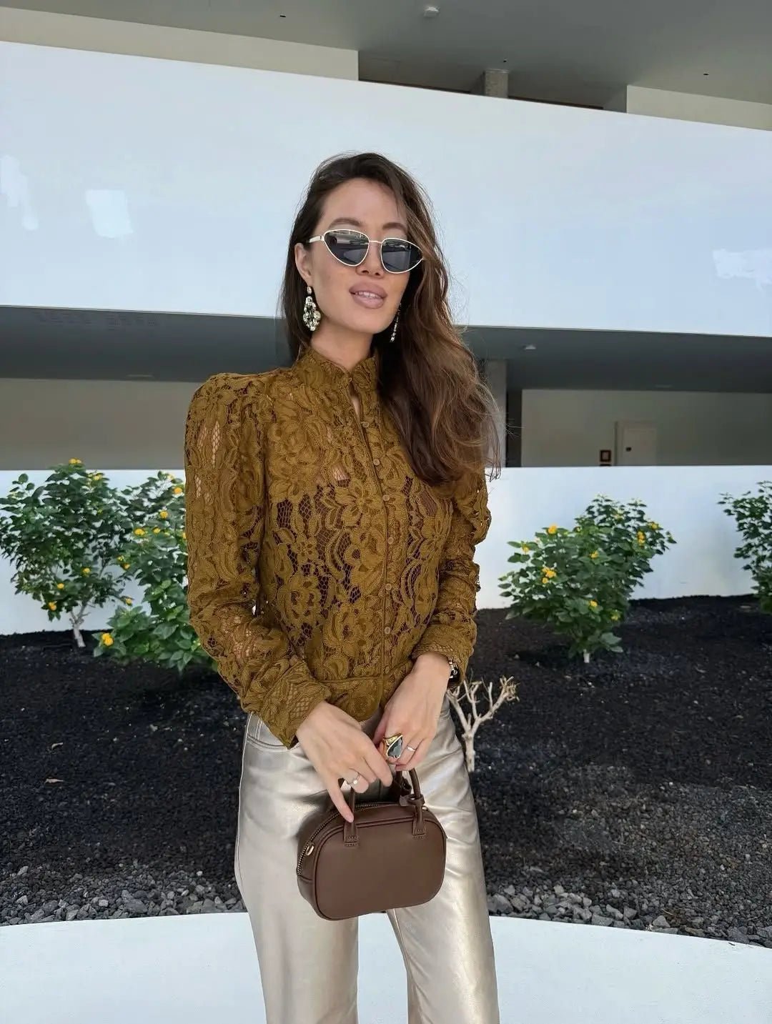 Blusa trasparente in pizzo Hannah