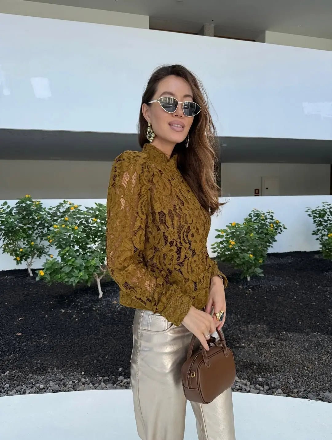 Blusa trasparente in pizzo Hannah