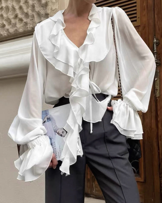 Blusa Monica con fiocco al collo e volant