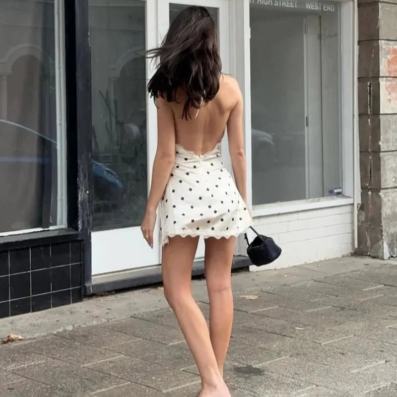 Abito mini Margot in pizzo senza schiena