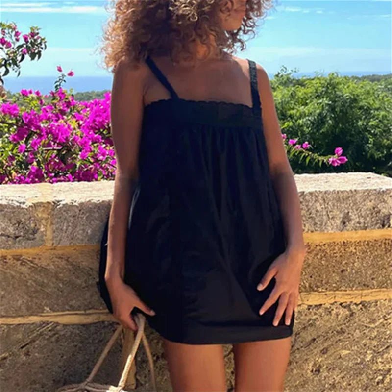 Abito mini Liora stile babydoll con rifinitura in pizzo