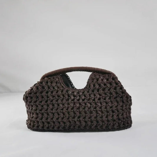 Pochette Sophia intrecciata in paglia con conchiglia