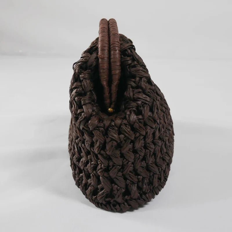 Pochette Sophia intrecciata in paglia con conchiglia
