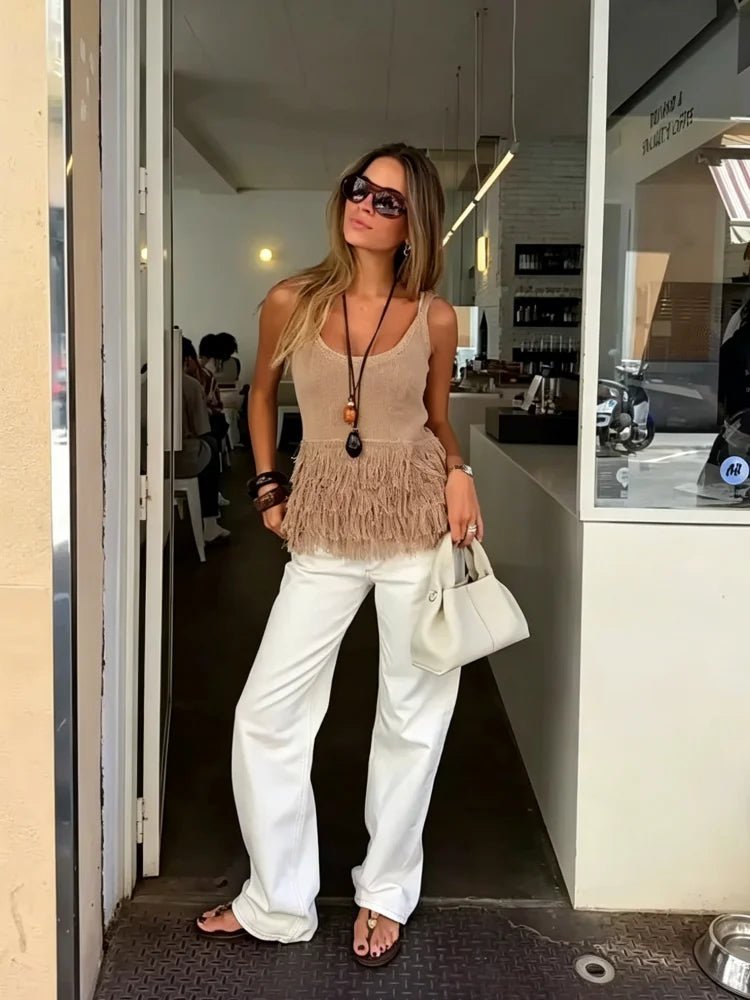 Top lavorato Hannah con nappine