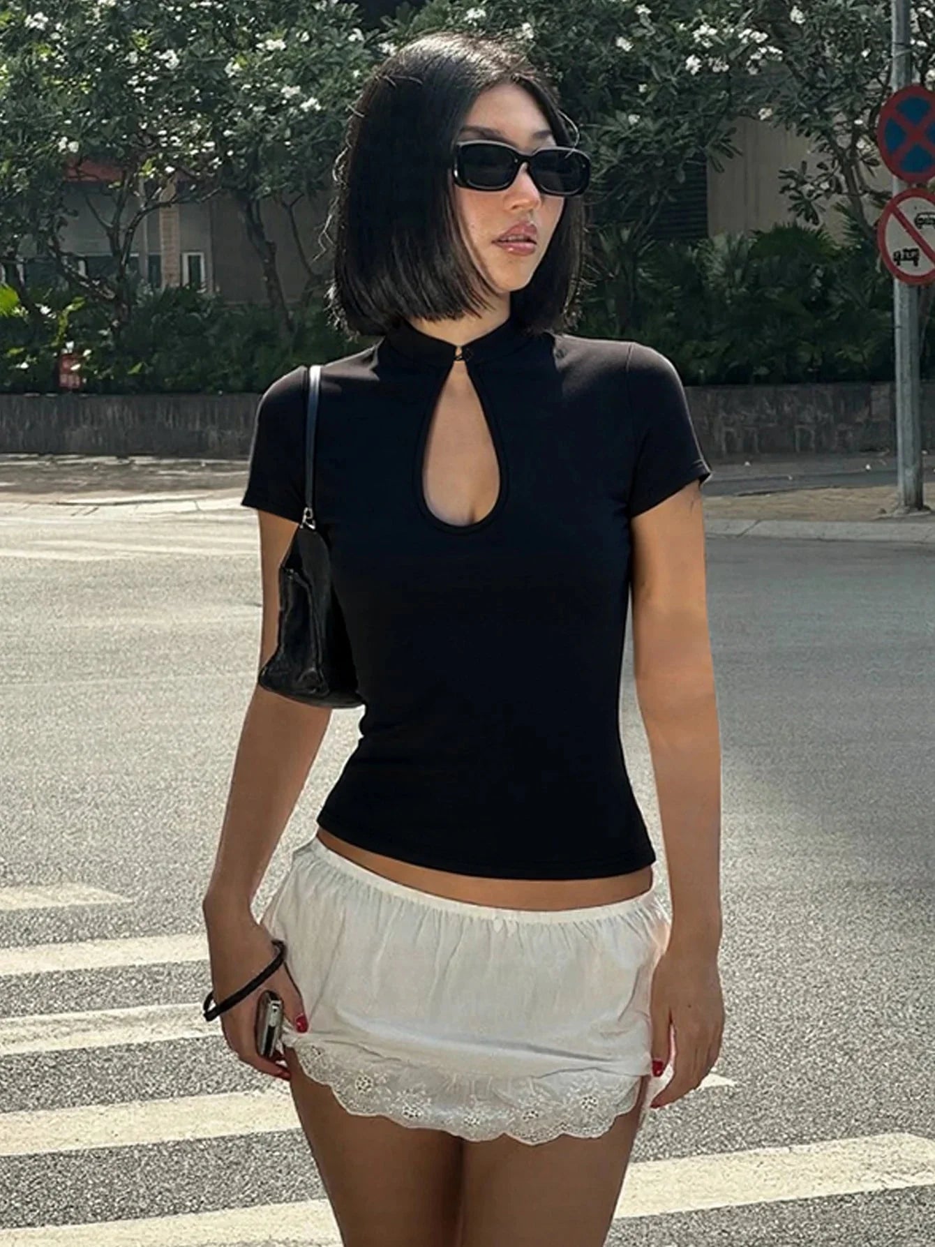 Blusa Ariane con collo alla coreana e bottoni a nodo