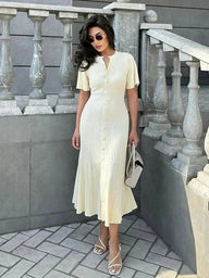 Abito midi in maglia plissettata con maniche a campana azzurro