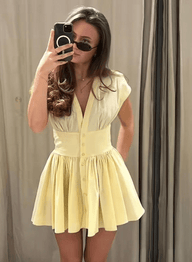 Minidress Brynn plissettato con bottoni frontali