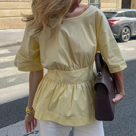 Blusa Jasmin scollata sulla schiena con volant