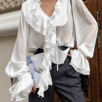 Blusa Monica con fiocco al collo e volant