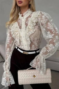 Blusa trasparente con volant e pizzo Valerie